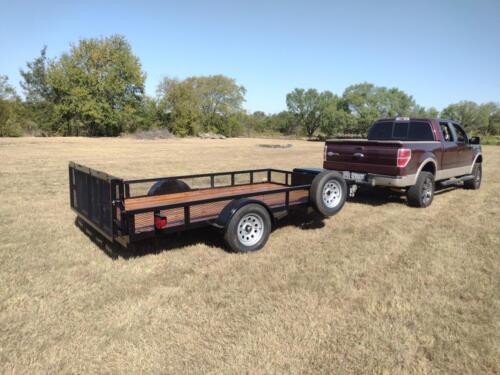 7 x 12 w/ Mesh Sides and Spring Assisted Bi-Fold Gate Custom Welded Trailer